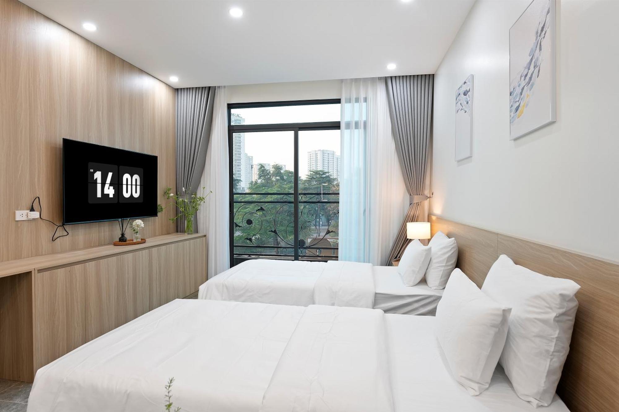 22Land Cosmos Hotel Hanoi Zimmer foto